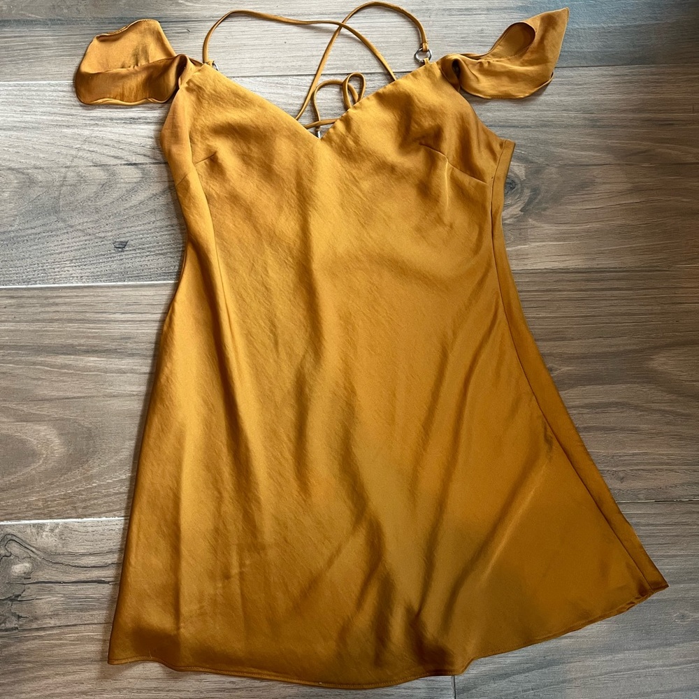 Free people intimates. Gold shirt or dress.